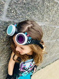 Punk Kidz Collab Goggles in black and white with pink, blue spikes